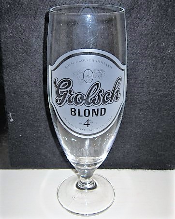 beer glass from the Grolsch brewery in Netherlands with the inscription 'Royal Grolsch Holland Grolsch Blond 4% Vakmanschap Meesterschap '