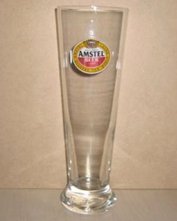 beer glass from the Amstel brewery in Netherlands with the inscription 'Amstel Lager All Over The World Quality Product Amstel Beer Lager'