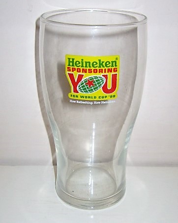beer glass from the Heineken brewery in Netherlands with the inscription 'Heineken Sponsoring You The World Cup 99 How Refreshing. How Heineken'