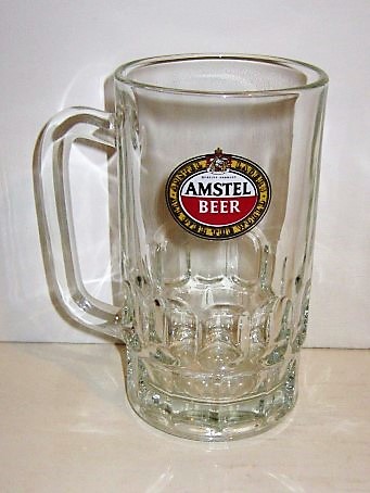 beer glass from the Amstel brewery in Netherlands with the inscription 'Amstel Beer Quality Product AmstelLager All Over The World'