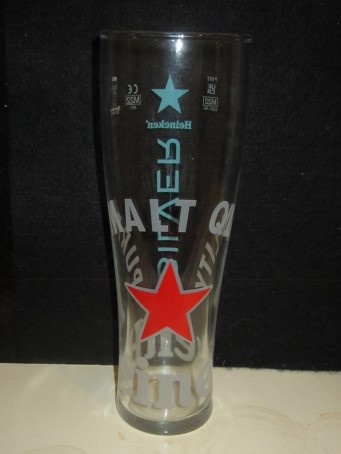 beer glass from the Heineken brewery in Netherlands with the inscription 'Pure Malt Quality Heineken'