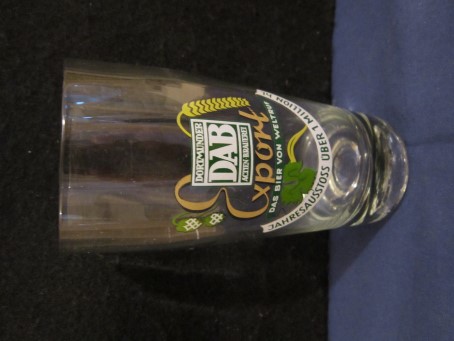 beer glass from the Dab brewery in Germany with the inscription 'Dab Dortmunder Actien Brauerei Das Bier Von Weltrdf Jahresausstoss Uber 1 Million HL'